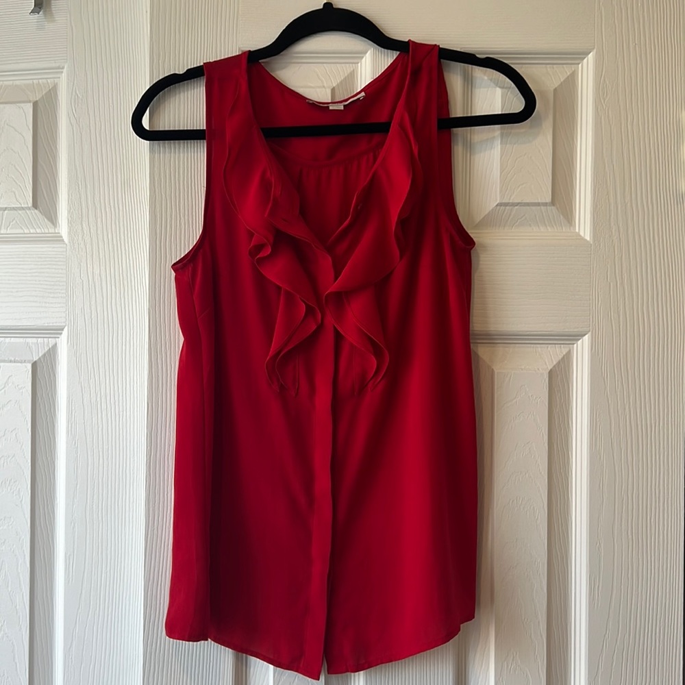 Red ruffle sleeveless button down blouse